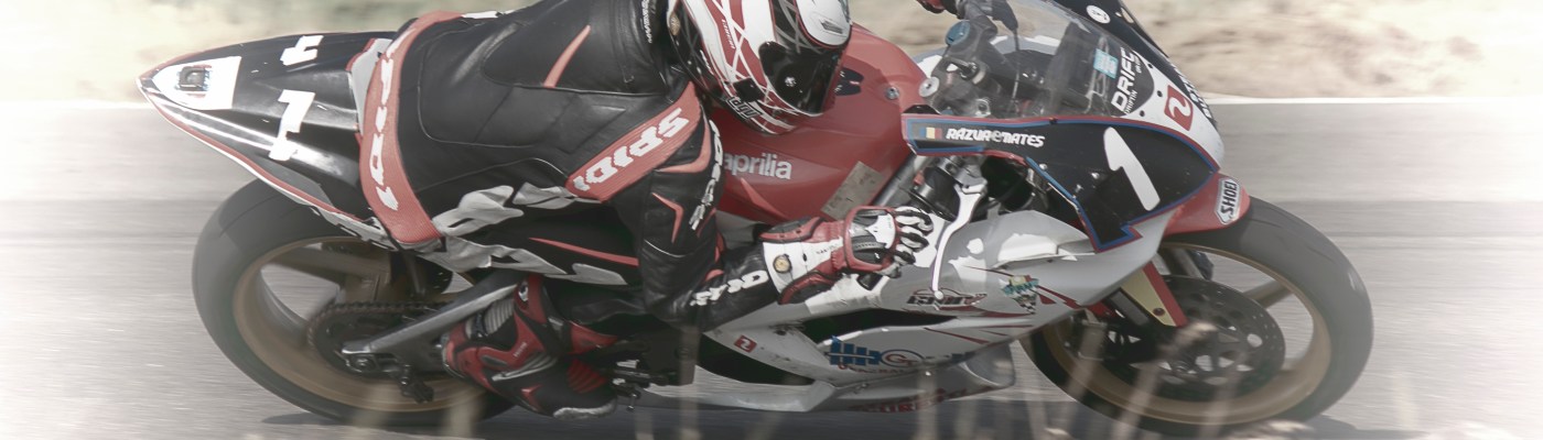 Razvan Mates racing at the East European Championship, 125SP category, right turn extreme leaning angle