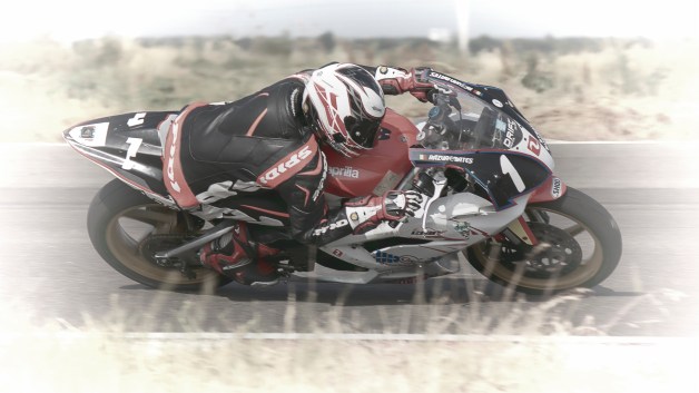 Razvan Mates racing at the East European Championship, 125SP category, right turn extreme leaning angle
