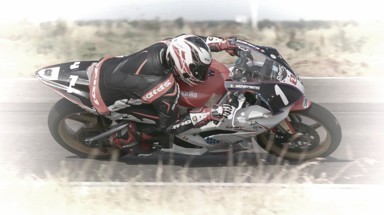 Razvan Mates racing at the East European Championship, 125SP category, right turn extreme leaning angle
