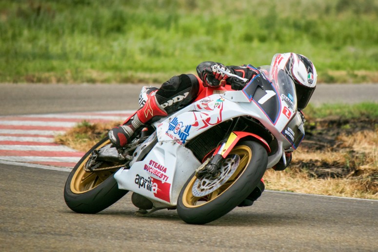 Razvan Mates racing the Aprilia bike at the East European Championship, 125SP category, left turn 6