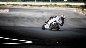 Razvan Mates during the SuperSport 600 race, in the Romanian National Championship, last turn, smoking the rear tire